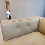 Fluid Curved Sectional Top-Grain Leather Sofa with Integrated Marble Side Platform